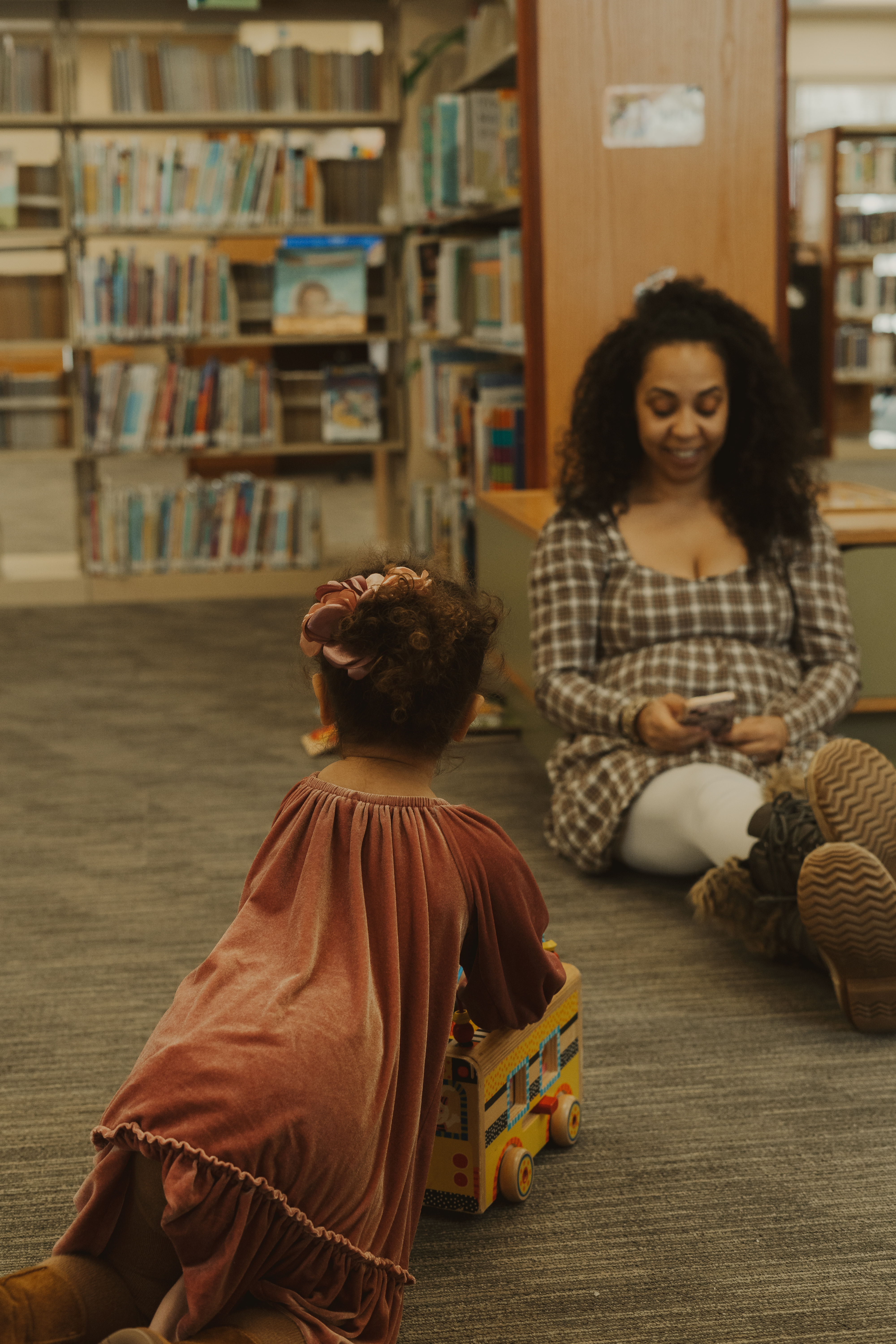Parent homeschooling young child